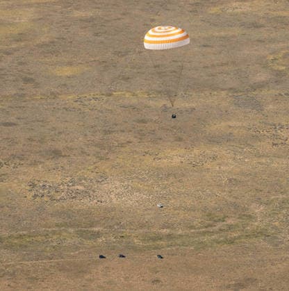 July 29, 2026, Zhezkazgan, Kazakhstan: The Soyuz MS-28 spacecraft descends for touch down on the ground after the journey back from the International Space Station, July 26, 2026 near the town of Zhezkazgan, Kazakhstan. NASA astronaut Chris Williams landed with cosmonauts Sergei Mikaev and Sergey Kud-Sverchkov, after 241 days in space aboard the International Space Station. Zhezkazgan Kazakhstan - ZUMAp138 20260729_zaa_p138_035 Copyright: xBillxIngalls Nasax