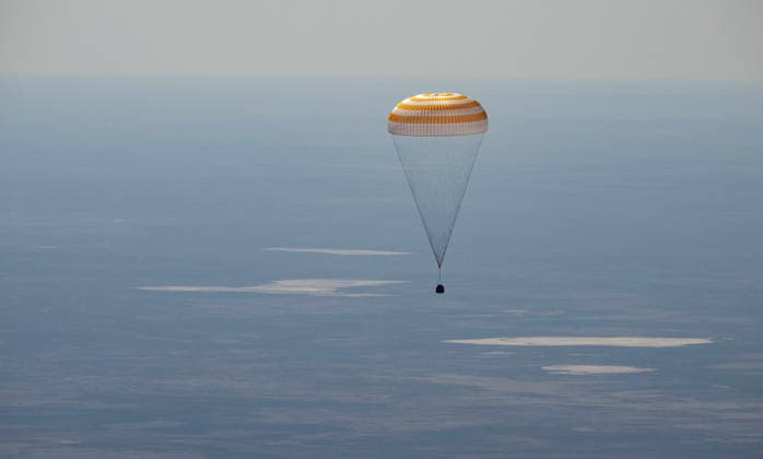 July 29, 2026, Zhezkazgan, Kazakhstan: The Soyuz MS-28 spacecraft descends for touch down on the ground after the journey back from the International Space Station, July 26, 2026 near the town of Zhezkazgan, Kazakhstan. NASA astronaut Chris Williams landed with cosmonauts Sergei Mikaev and Sergey Kud-Sverchkov, after 241 days in space aboard the International Space Station. Zhezkazgan Kazakhstan - ZUMAp138 20260729_zaa_p138_038 Copyright: xBillxIngalls Nasax
