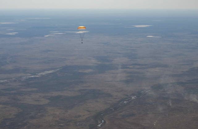 July 29, 2026, Zhezkazgan, Kazakhstan: The Soyuz MS-28 spacecraft descends for touch down on the ground after the journey back from the International Space Station, July 26, 2026 near the town of Zhezkazgan, Kazakhstan. NASA astronaut Chris Williams landed with cosmonauts Sergei Mikaev and Sergey Kud-Sverchkov, after 241 days in space aboard the International Space Station. Zhezkazgan Kazakhstan - ZUMAp138 20260729_zaa_p138_039 Copyright: xBillxIngalls Nasax