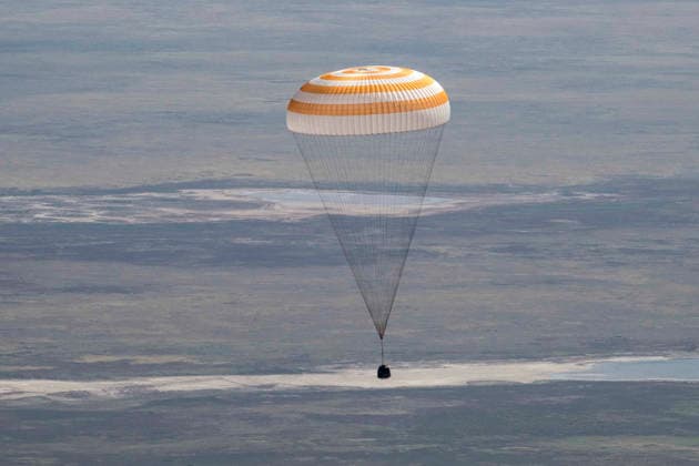 July 29, 2026, Zhezkazgan, Kazakhstan: The Soyuz MS-28 spacecraft descends for touch down on the ground after the journey back from the International Space Station, July 26, 2026 near the town of Zhezkazgan, Kazakhstan. NASA astronaut Chris Williams landed with cosmonauts Sergei Mikaev and Sergey Kud-Sverchkov, after 241 days in space aboard the International Space Station. Zhezkazgan Kazakhstan - ZUMAp138 20260729_zaa_p138_042 Copyright: xBillxIngalls Nasax