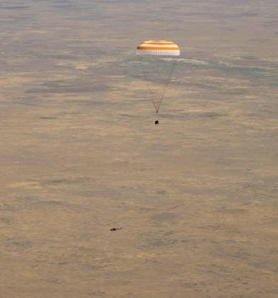 July 29, 2026, Zhezkazgan, Kazakhstan: The Soyuz MS-28 spacecraft descends for touch down on the ground after the journey back from the International Space Station, July 26, 2026 near the town of Zhezkazgan, Kazakhstan. NASA astronaut Chris Williams landed with cosmonauts Sergei Mikaev and Sergey Kud-Sverchkov, after 241 days in space aboard the International Space Station. Zhezkazgan Kazakhstan - ZUMAp138 20260729_zaa_p138_045 Copyright: xBillxIngalls Nasax