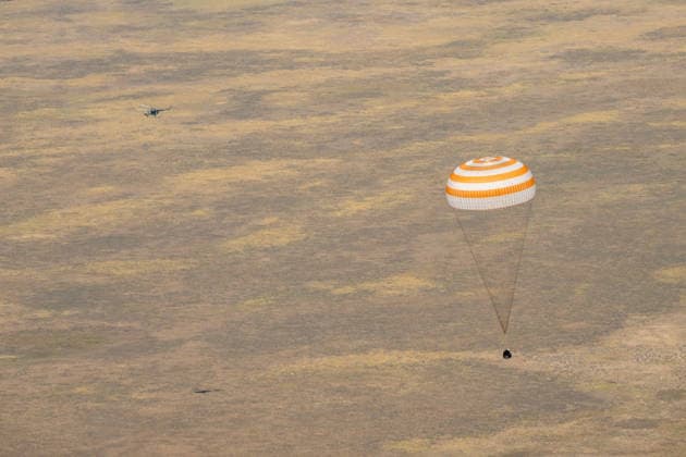 July 29, 2026, Zhezkazgan, Kazakhstan: The Soyuz MS-28 spacecraft descends for touch down on the ground after the journey back from the International Space Station, July 26, 2026 near the town of Zhezkazgan, Kazakhstan. NASA astronaut Chris Williams landed with cosmonauts Sergei Mikaev and Sergey Kud-Sverchkov, after 241 days in space aboard the International Space Station. Zhezkazgan Kazakhstan - ZUMAp138 20260729_zaa_p138_044 Copyright: xBillxIngalls Nasax