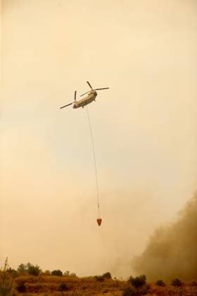 Firefighting efforts continue in Turkiye s Mugla MUGLA, TURKIYE - JULY 29: Firefighters battle the wildfire with ground and aerial operations in Seydikemer district of Mugla, Turkiye on July 29, 2026. Ali Riza Akkir Anadolu Mugla Turkey. Editorial use only. Please get in touch for any other usage.  Copyright: x2026xAnadoluxAlixRizaxAkkirx