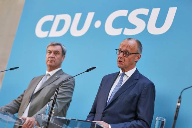 Berlin, Deutschland, 29.07.2026: Deutscher Bundestag: Pressekonferenz nach Sondersitzung der Unionsfraktion: Markus Söder (CSU) und Bundeskanzler Friedrich Merz (CDU) *** Berlin, Germany, July 29, 2026 German Bundestag Press Conference Following a Special Meeting of the Union Parliamentary Group Markus Söder (CSU) and Federal Chancellor Friedrich Merz (CDU) Copyright: xdtsxNachrichtenagenturx dts_128876
