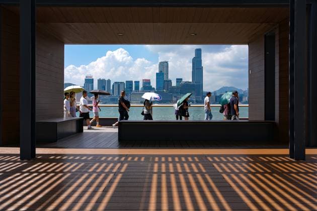 RECORD DATE NOT STATED People walks under hot weather at the waterfront in Wan Chai. 23JUL26 SCMP Sam Tsang HONG KONG CHINA EDITORIAL USE ONLY  Copyright: xx 202607237b2987e3 SamxTsangx scmpphotostwo029935