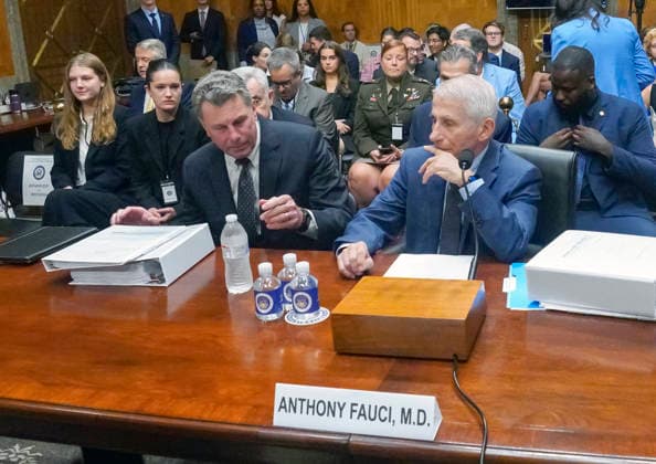 July 29, 2026, Washington, District Of Columbia, USA: Dr Anthony Fauci, former Director, National Institute of Allergy and Infectious Diseases at the National Institutes of Health (NIH), right, takes his seat at the witness table as he prepares to testify before the US Senate Committee on Homeland Security and Governmental Affairs in the Dirksen Senate Office Building on Capitol Hill in Washington, DC, USA, on Wednesday, July 29, 2026. At left Fauci attorney David Schertler sits at the witness table, even though US Senator Rand Paul, MD (Republican of Kentucky), committee chair said he was not authorized to do so Washington USA  - ZUMAs152 20260729_faa_s152_003 Copyright: xAndrewxThomasx