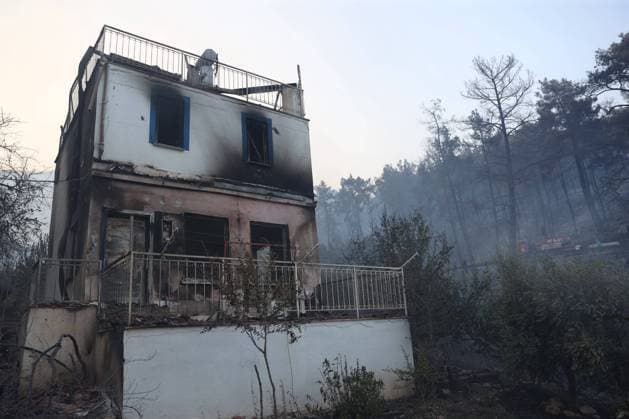 Firefighting efforts continue in Antalya s Kumluca ANTALYA, TURKIYE - JULY 29: General view of the destruction and a house damaged by fire as firefighters and Turkish General Directorate of Forestry teams continue their efforts to extinguish the fire that broke out in the forest area from air and land in Kumluca district of Antalya, Turkiye on July 29, 2026. Suleyman Elcin Anadolu Antalya Turkey. Editorial use only. Please get in touch for any other usage.  Copyright: x2026xAnadoluxSuleymanxElcinx