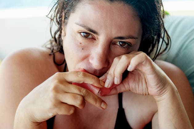 Close-up of adult woman eating slice of watermelon Eivissa, Balearic Islands, Spain R_THNZ260722-2083067-01 ,model released, Symbolfoto ,property released