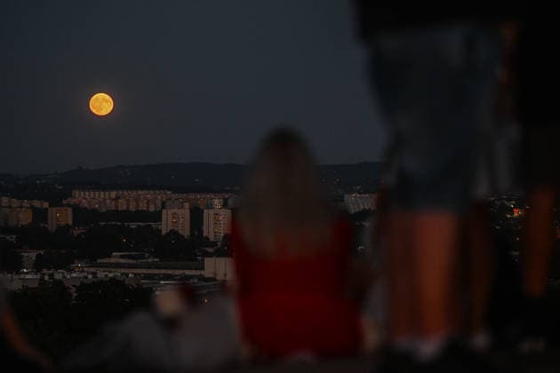 Full Buck Moon in Poland KRAKOW, POLAND - JULY 29 : People watch the full Deer or Buck moon raising in the horizon in at the Krakus Mound in Krakow, Poland on July 29, 2026. The Buck Moon is&nbsp;the traditional name for the full moon that occurs in July. It gets its name from Native American Algonquin tribes because it coincides with the time of year when male deer (bucks) begin to grow and push out their new antlers. Omar Marques Anadolu Krakow Poland. Editorial use only. Please get in touch for any other usage.  Copyright: x2026xAnadoluxOmarxMarquesx