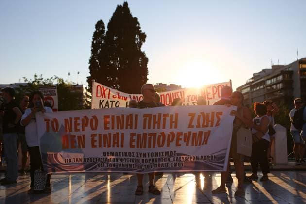 Protest against Greek water management reform bill outside Parliament ATHENS, GREECE JULY 29, 2026: Demonstrators gather outside the Hellenic Parliament in Syntagma Square during a protest against the government s proposed water management reform bill. Organisers called for the withdrawal of legislation expanding the responsibilities of Athens and Thessaloniki water utilities (EYDAP and EYATH), arguing that it could pave the way for the commercialization of water services and undermine public control over water resources. Photos: Harris Xanthopoulos JNA Press Athens Greece Copyright: x xHarrisxXanthopoulosx xJNAxPressx