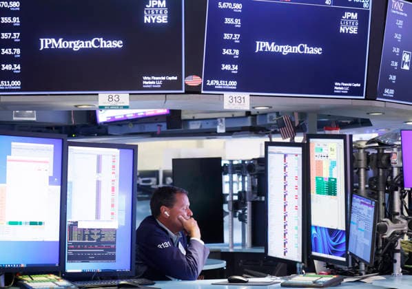 Traders work on the floor of the New York Stock Exchange on Wall Street on Wednesday, July 29, 2026 in New York City. Stocks tumbled for multiple reasons on Wednesday as the central bank chose to keep interest rates unchanged. The Dow Jones Industrial Average closed 1,153 points lower, or 2.2%, for its worst decline since April 2025.  NYP20260729104 JOHNxANGELILLO