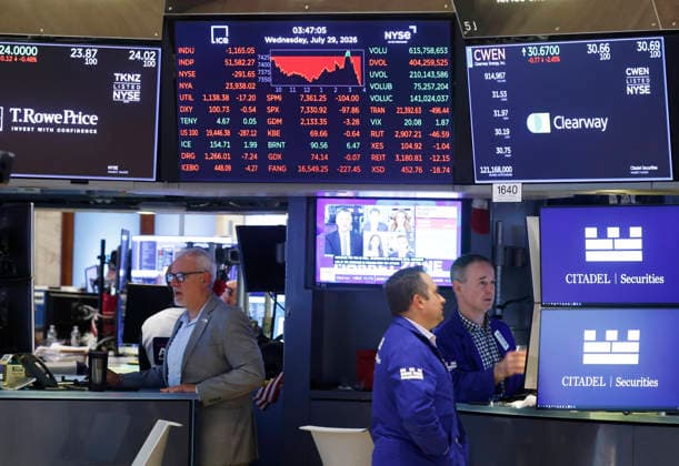 Traders work on the floor of the New York Stock Exchange on Wall Street on Wednesday, July 29, 2026 in New York City. Stocks tumbled for multiple reasons on Wednesday as the central bank chose to keep interest rates unchanged. The Dow Jones Industrial Average closed 1,153 points lower, or 2.2%, for its worst decline since April 2025.  NYP20260729106 JOHNxANGELILLO