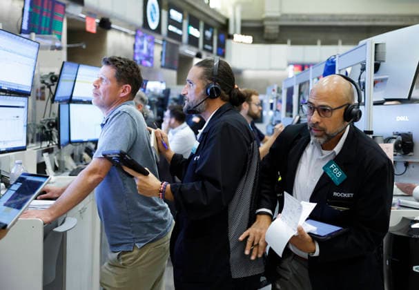 Traders work on the floor of the New York Stock Exchange at the NYSE Options Market on Wall Street on Wednesday, July 29, 2026 in New York City. Stocks tumbled for multiple reasons on Wednesday as the central bank chose to keep interest rates unchanged. The Dow Jones Industrial Average closed 1,153 points lower, or 2.2%, for its worst decline since April 2025.  NYP20260729110 JOHNxANGELILLO