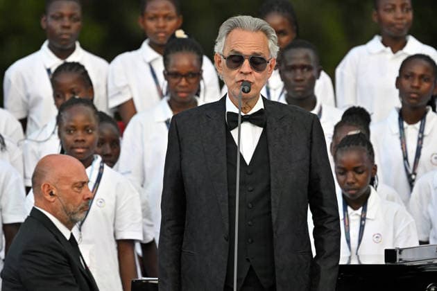 ITALY - POPE LEO XIV DURING A CONCERT IN BORGO LAUDATO SI , A 55-HECTARE EDUCATIONAL AND ENVIRONMENTAL CENTER, AT CASTEL GANDOLFO - 2026 7 29 Italy, Castel Gandolfo , Vatican, 2026 7 29 Italian singer Andrea Bocelli performs during the Canticle of Peace prayer and fraternity meeting with Pope Leo XIV at Borgo Laudato Si in Castel Gandolfo, about 30 kilometers (19 miles) southwest of Rome, Italy. EDITORIAL USE ONLY - NO BOOKS Copyright: xALESSIAxGIULIANIx