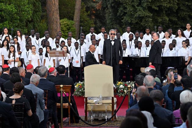 ITALY - POPE LEO XIV DURING A CONCERT IN BORGO LAUDATO SI , A 55-HECTARE EDUCATIONAL AND ENVIRONMENTAL CENTER, AT CASTEL GANDOLFO - 2026 7 29 Italy, Castel Gandolfo , Vatican, 2026 7 29 Italian singer Andrea Bocelli performs during the Canticle of Peace prayer and fraternity meeting with Pope Leo XIV at Borgo Laudato Si in Castel Gandolfo, about 30 kilometers (19 miles) southwest of Rome, Italy. EDITORIAL USE ONLY - NO BOOKS Copyright: xALESSIAxGIULIANIx