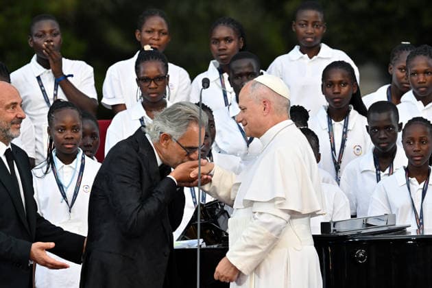 ITALY - POPE LEO XIV DURING A CONCERT IN BORGO LAUDATO SI , A 55-HECTARE EDUCATIONAL AND ENVIRONMENTAL CENTER, AT CASTEL GANDOLFO - 2026 7 29 Italy, Castel Gandolfo , Vatican, 2026 7 29 Italian singer Andrea Bocelli performs during the Canticle of Peace prayer and fraternity meeting with Pope Leo XIV at Borgo Laudato Si in Castel Gandolfo, about 30 kilometers (19 miles) southwest of Rome, Italy. EDITORIAL USE ONLY - NO BOOKS Copyright: xALESSIAxGIULIANIx