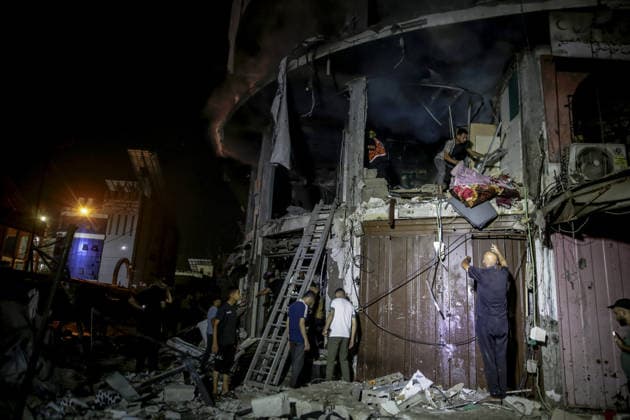Israeli army continues attacks on civilian homes in Gaza GAZA CITY, GAZA STRIP, PALESTINE - JULY 30: Firefighters respond to a fire in a damaged building near Al-Ahli (Baptist) Hospital after an Israeli strike in eastern Gaza City, Gaza Strip, Palestine on July 30, 2026. According to local sources, the strike targeted the building near the hospital following a renewed ceasefire violation, causing damage and igniting a fire. Saeed M. M. T. Jaras Anadolu Gaza City Gaza. Editorial use only. Please get in touch for any other usage.  Copyright: x2026xAnadoluxSaeedxM.xM.xT.xJarasx