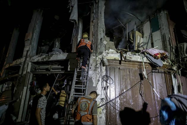Israeli army continues attacks on civilian homes in Gaza GAZA CITY, GAZA STRIP, PALESTINE - JULY 30: Firefighters respond to a fire in a damaged building near Al-Ahli (Baptist) Hospital after an Israeli strike in eastern Gaza City, Gaza Strip, Palestine on July 30, 2026. According to local sources, the strike targeted the building near the hospital following a renewed ceasefire violation, causing damage and igniting a fire. Saeed M. M. T. Jaras Anadolu Gaza City Gaza. Editorial use only. Please get in touch for any other usage.  Copyright: x2026xAnadoluxSaeedxM.xM.xT.xJarasx