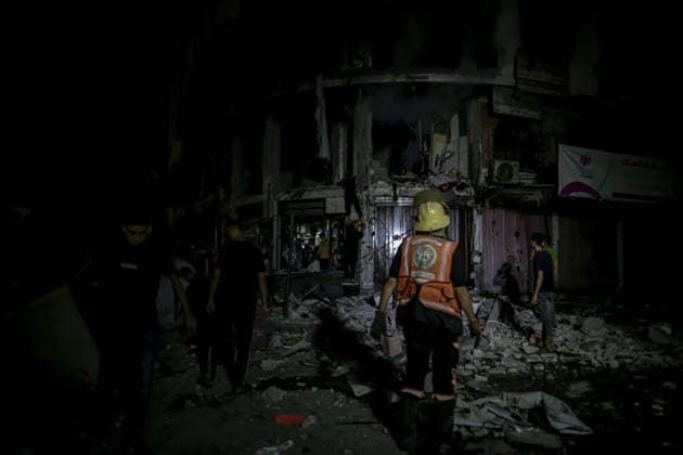 Israeli army continues attacks on civilian homes in Gaza GAZA CITY, GAZA STRIP, PALESTINE - JULY 30: Firefighters respond to a fire in a damaged building near Al-Ahli (Baptist) Hospital after an Israeli strike in eastern Gaza City, Gaza Strip, Palestine on July 30, 2026. According to local sources, the strike targeted the building near the hospital following a renewed ceasefire violation, causing damage and igniting a fire. Saeed M. M. T. Jaras Anadolu Gaza City Gaza. Editorial use only. Please get in touch for any other usage.  Copyright: x2026xAnadoluxSaeedxM.xM.xT.xJarasx