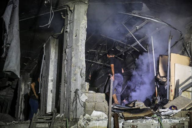 Israeli army continues attacks on civilian homes in Gaza GAZA CITY, GAZA STRIP, PALESTINE - JULY 30: Firefighters respond to a fire in a damaged building near Al-Ahli (Baptist) Hospital after an Israeli strike in eastern Gaza City, Gaza Strip, Palestine on July 30, 2026. According to local sources, the strike targeted the building near the hospital following a renewed ceasefire violation, causing damage and igniting a fire. Saeed M. M. T. Jaras Anadolu Gaza City Gaza. Editorial use only. Please get in touch for any other usage.  Copyright: x2026xAnadoluxSaeedxM.xM.xT.xJarasx