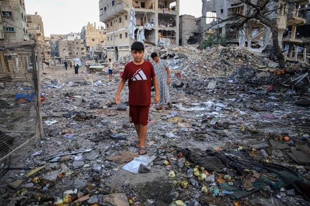 Palestinians inspect damaged homes after Israeli airstrike in Gaza City GAZA CITY, PALESTINE JULY 30, 2026: Palestinians inspect damaged homes following an Israeli airstrike that struck the Shamia family house overnight in Gaza City, causing extensive destruction to the targeted building and damage to neighboring homes amid the ongoing war in the Gaza Strip. Gaza Palestine, State of Copyright: x xMohammedxMxSkaikx xJNAxPressx