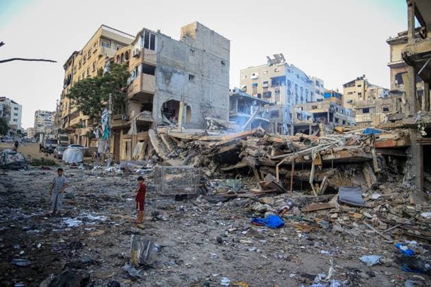 Palestinians inspect damaged homes after Israeli airstrike in Gaza City GAZA CITY, PALESTINE JULY 30, 2026: Palestinians inspect damaged homes following an Israeli airstrike that struck the Shamia family house overnight in Gaza City, causing extensive destruction to the targeted building and damage to neighboring homes amid the ongoing war in the Gaza Strip. Gaza Palestine, State of Copyright: x xMohammedxMxSkaikx xJNAxPressx