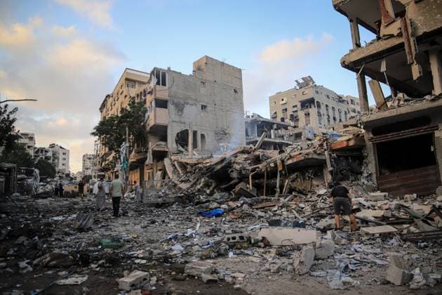 Palestinians inspect damaged homes after Israeli airstrike in Gaza City GAZA CITY, PALESTINE JULY 30, 2026: Palestinians inspect damaged homes following an Israeli airstrike that struck the Shamia family house overnight in Gaza City, causing extensive destruction to the targeted building and damage to neighboring homes amid the ongoing war in the Gaza Strip. Gaza Palestine, State of Copyright: x xMohammedxMxSkaikx xJNAxPressx