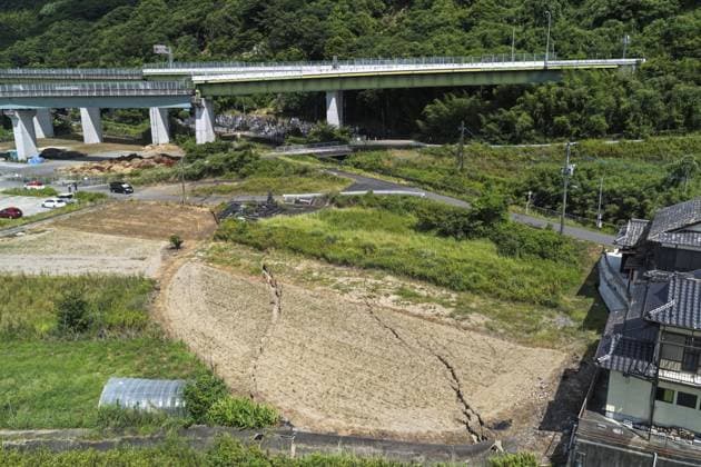 Aftermath of strong earthquake in Kumamoto Photo taken from a drone shows cracks in the ground in Yatsushiro, Kumamoto Prefecture, on July 29, 2026, a day after a powerful earthquake struck the southwestern Japan prefecture and its vicinity.  A14AA0005624552P
