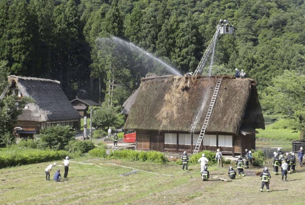 Thatched-roof house catches fire in World Heritage-listed village Firefighters water a traditional thatched-roof house in the World Heritage-listed Gokayama hamlet in Nanto in Toyama Prefecture, central Japan, on July 30, 2026. No one was injured in the fire, put under control about 50 minutes after the incident was reported to the local fire station.  A14AA0005624597P