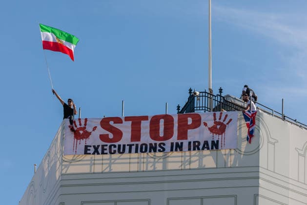 Stop Executions in Iran Protest, London, UK Piccadilly Circus, London, UK. 30th July 2026. Iranian freedom advocates stage a public protest in London s Piccadilly Circus, displaying a large banner reading STOP EXECUTIONS IN IRAN, along with the Iranian Lion and Sun and UK Union flags, urging the international community to pay greater attention to the use of the death penalty in Iran and to support efforts aimed at ending executions., Credit:Photo by Amanda Rose Amanda Rose Avalon United Kingdom, Westminster, London, Piccadilly Circus  Copyright: xPhotoxbyxAmandaxRosex xAmandaxRosex xAvalonx 1119677780