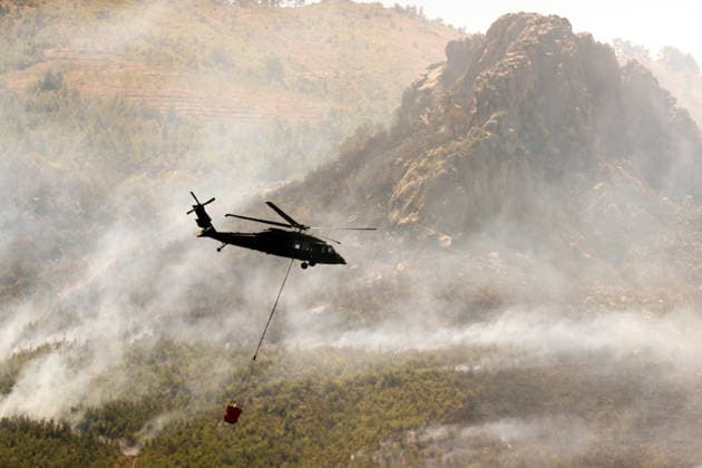 Firefighters battle wildfire in Antalya from air and ground ANTALYA, TURKIYE - JULY 30 : Fire extinguishing efforts continue both from the air and land to contain a wildfire in the Alanya district of Mugla, Turkiye on July 30, 2026. Serhat Cetinkaya Anadolu Antalya Turkey. Editorial use only. Please get in touch for any other usage.  Copyright: x2026xAnadoluxSerhatxCetinkayax