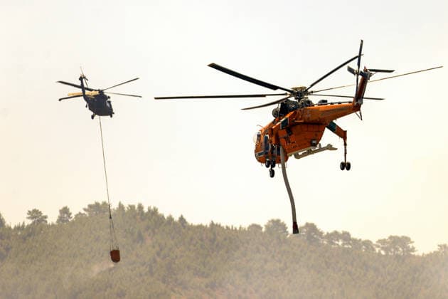 Firefighters battle wildfire in Antalya from air and ground ANTALYA, TURKIYE - JULY 30 : Fire extinguishing efforts continue both from the air and land to contain a wildfire in the Alanya district of Mugla, Turkiye on July 30, 2026. Serhat Cetinkaya Anadolu Antalya Turkey. Editorial use only. Please get in touch for any other usage.  Copyright: x2026xAnadoluxSerhatxCetinkayax