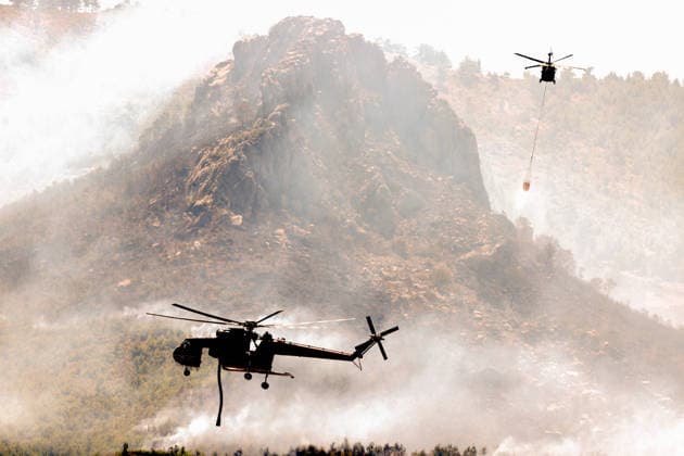 Firefighters battle wildfire in Antalya from air and ground ANTALYA, TURKIYE - JULY 30 : Fire extinguishing efforts continue both from the air and land to contain a wildfire in the Alanya district of Mugla, Turkiye on July 30, 2026. Serhat Cetinkaya Anadolu Antalya Turkey. Editorial use only. Please get in touch for any other usage.  Copyright: x2026xAnadoluxSerhatxCetinkayax