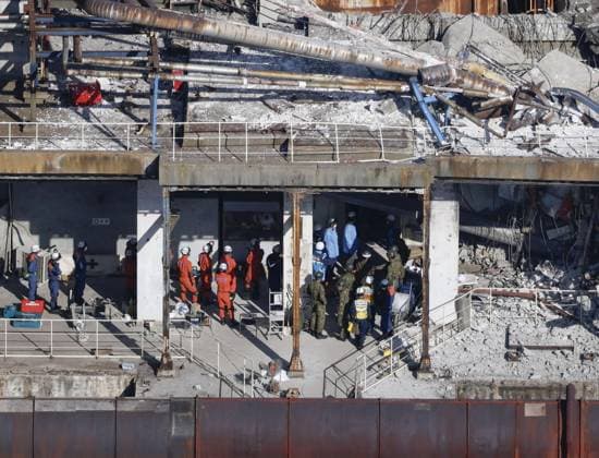 Aftermath of strong earthquake in Kumamoto Photo taken from a Kyodo News helicopter shows search and rescue operations continuing for a missing person at a partially destroyed Nippon Paper Industries Co. plant in Yatsushiro, Kumamoto Prefecture, on July 30, 2026, two days after a powerful earthquake hit the southwestern Japan prefecture.  A14AA0005624609P