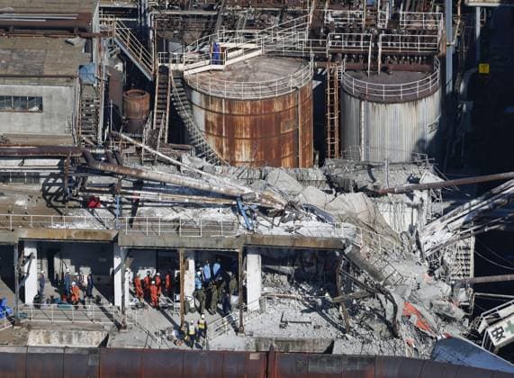 Aftermath of strong earthquake in Kumamoto Photo taken from a Kyodo News helicopter shows search and rescue operations continuing for a missing person at a partially destroyed Nippon Paper Industries Co. plant in Yatsushiro, Kumamoto Prefecture, on July 30, 2026, two days after a powerful earthquake hit the southwestern Japan prefecture.  A14AA0005624611P