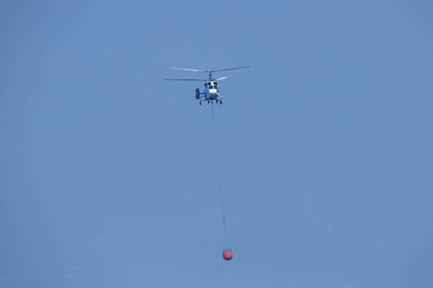 Firefighters battle wildfire in Mugla from air and ground MUGLA, TURKIYE - JULY 30 : Fire extinguishing efforts continue both from the air and land to contain a wildfire in the Seydikemer district of Mugla, Turkiye on July 30, 2026. Mahmut Serdar Alakus Anadolu Mugla Turkey. Editorial use only. Please get in touch for any other usage.  Copyright: x2026xAnadoluxMahmutxSerdarxAlakusx
