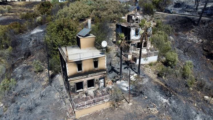 Aerial ciew reveals wildfire damage in Kumluca, Antalya ANTALYA, TURKIYE - JULY 30: An aerial view shows forested areas and buildings damaged by a wildfire that was brought under control in the Kumluca district of Antalya, on July 30, 2026 in Antalya, Turkiye. The fire left large areas of vegetation scorched and caused damage to properties in the affected region. Kasim Sakalli Anadolu Antalya Turkey. Editorial use only. Please get in touch for any other usage.  Copyright: x2026xAnadoluxKasimxSakallix