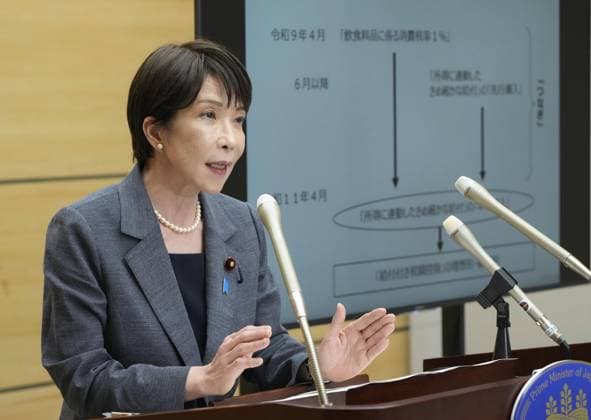 Japan to cut consumption tax on food to 1% from April 2027 Japanese Prime Minister Sanae Takaichi, during a press conference in Tokyo on July 30, 2026, explains the government s plan to cut the consumption tax rate on food and beverages to 1 percent from the current 8 percent for two years starting in April 2027.  A14AA0005624612P