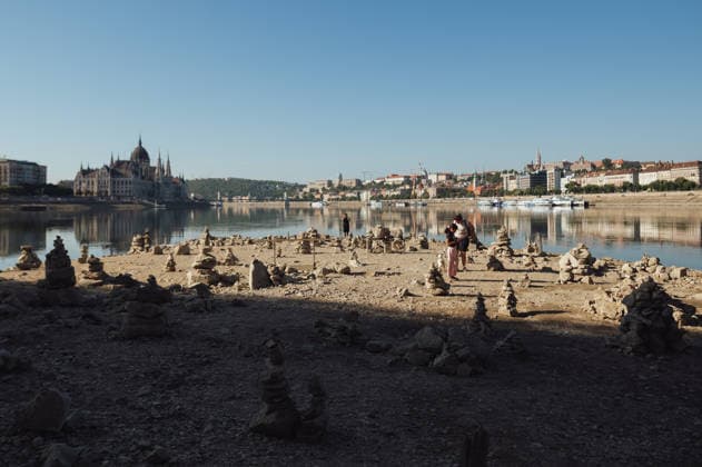 Rived Danube reaches historic record low levels in Budapest BUDAPEST, HUNGARY - JULY 30: A view of the Danube River as it reaches historic record-low water levels in Budapest, Hungary, on July 30, 2026. Following weeks of extreme heat and prolonged drought, the receding river has exposed large sections of the riverbed, rocks and sandbars along the capital s waterfront. The unusually low water levels have disrupted river navigation and highlighted the impact of persistent dry weather across Central Europe. Robert Nemeti Anadolu Budapest Hungary. Editorial use only. Please get in touch for any other usage.  Copyright: x2026xAnadoluxRobertxNemetix