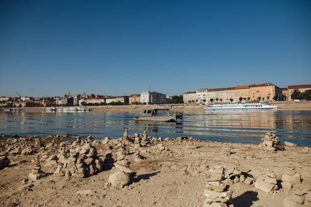 Rived Danube reaches historic record low levels in Budapest BUDAPEST, HUNGARY - JULY 30: A view of the Danube River as it reaches historic record-low water levels in Budapest, Hungary, on July 30, 2026. Following weeks of extreme heat and prolonged drought, the receding river has exposed large sections of the riverbed, rocks and sandbars along the capital s waterfront. The unusually low water levels have disrupted river navigation and highlighted the impact of persistent dry weather across Central Europe. Robert Nemeti Anadolu Budapest Hungary. Editorial use only. Please get in touch for any other usage.  Copyright: x2026xAnadoluxRobertxNemetix