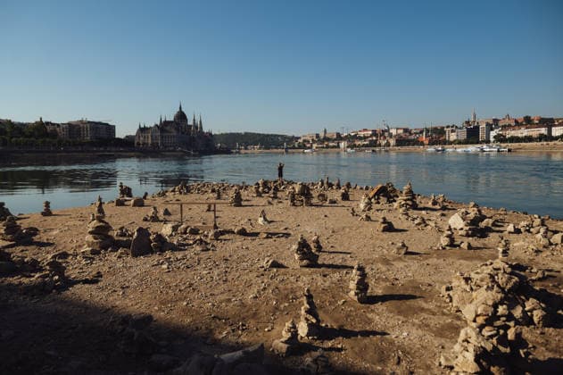 Rived Danube reaches historic record low levels in Budapest BUDAPEST, HUNGARY - JULY 30: A view of the Danube River as it reaches historic record-low water levels in Budapest, Hungary, on July 30, 2026. Following weeks of extreme heat and prolonged drought, the receding river has exposed large sections of the riverbed, rocks and sandbars along the capital s waterfront. The unusually low water levels have disrupted river navigation and highlighted the impact of persistent dry weather across Central Europe. Robert Nemeti Anadolu Budapest Hungary. Editorial use only. Please get in touch for any other usage.  Copyright: x2026xAnadoluxRobertxNemetix