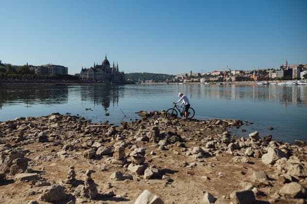 Rived Danube reaches historic record low levels in Budapest BUDAPEST, HUNGARY - JULY 30: A view of the Danube River as it reaches historic record-low water levels in Budapest, Hungary, on July 30, 2026. Following weeks of extreme heat and prolonged drought, the receding river has exposed large sections of the riverbed, rocks and sandbars along the capital s waterfront. The unusually low water levels have disrupted river navigation and highlighted the impact of persistent dry weather across Central Europe. Robert Nemeti Anadolu Budapest Hungary. Editorial use only. Please get in touch for any other usage.  Copyright: x2026xAnadoluxRobertxNemetix