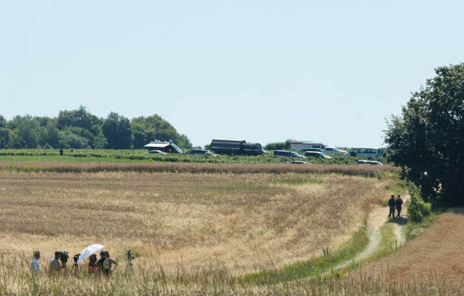 Russian missile crashed in eastern Poland Photo: Wojciech Olkusnik East News Military and security services vehicles and personnel are seen at the site of a crater in a field left by an unidentified object that is believed to be a Russian missile near the village of Tarnawa Kolonia on July 30, 2026 in eastern Poland. EN_01681810_0071 