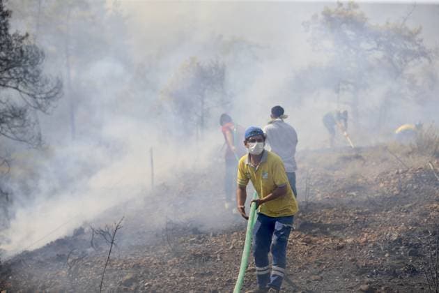 The forest fire in Fethiye, which had been brought under control, reignited due to the wind FETHIYE, TURKIYE - JULY 30: Firefighters, Turkish General Directorate of Forestry teams and forest workers continue their efforts from air and land to extinguish the fire that reignited due to the wind after having been brought under control in Fethiye district of Mugla, Turkiye on July 30, 2026. Ali Riza Akkir Anadolu Mugla Turkey. Editorial use only. Please get in touch for any other usage.  Copyright: x2026xAnadoluxAlixRizaxAkkirx