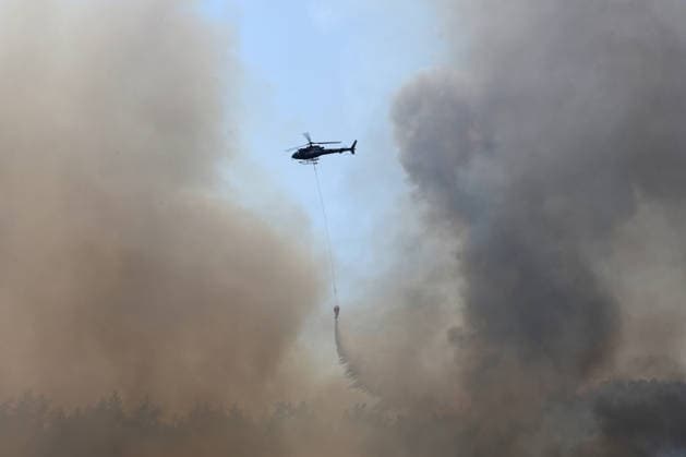 Firefighters battle wildfire in Fethiye from air and ground MUGLA, TURKIYE - JULY 30: Aerial and ground crews battle a forest fire that reignites after winds intensify in the Fethiye district of Mugla, Turkiye, on July 30, 2026. Fatih Hepokur Anadolu Mugla Turkey. Editorial use only. Please get in touch for any other usage.  Copyright: x2026xAnadoluxFatihxHepokurx