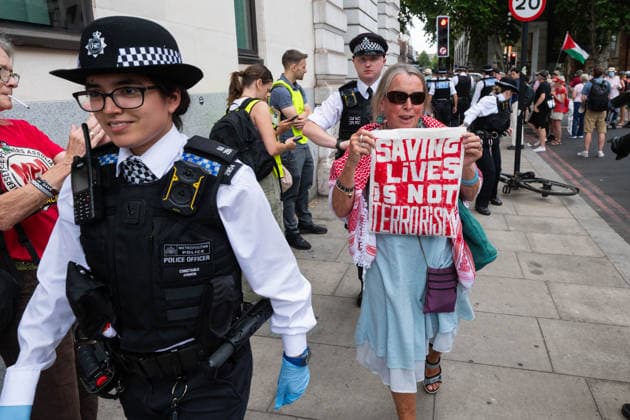 July 30, 2026, London, England, United Kingdom: Metropolitan Police officers arrest a protester during a demonstration outside Westminster Magistrates Court in central London on July 30, 2026. The protest, organised by Defend Our Juries, opposed the proscription of Palestine Action and the use of terrorism legislation against demonstrators. London United Kingdom  - ZUMAk172 20260730_zip_k172_026 Copyright: xThomasxKrychx