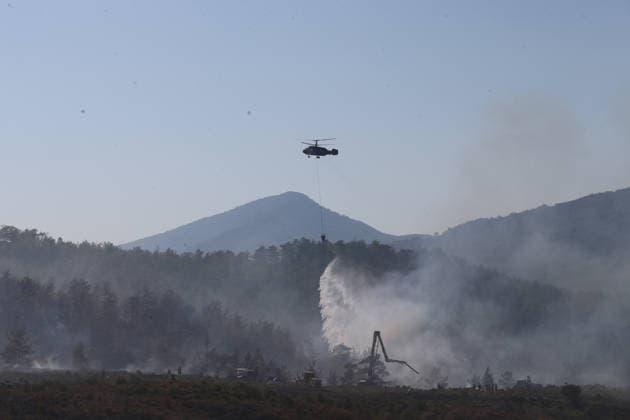 Firefighters battle wildfire in Fethiye from air and ground MUGLA, TURKIYE - JULY 30: Aerial and ground crews battle a wildfire that reignited due to strong winds in Fethiye district of Mugla, Turkiye, on July 30, 2026. Fatih Hepokur Anadolu Mugla Turkey. Editorial use only. Please get in touch for any other usage.  Copyright: x2026xAnadoluxFatihxHepokurx