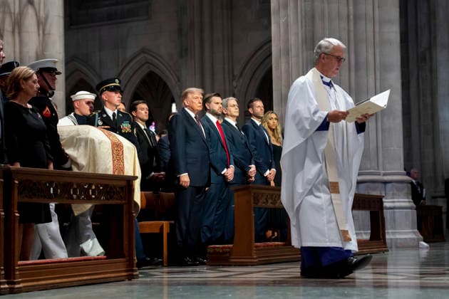 July 30, 2026, Washington, Dc, United States: U.S. President Donald Trump, center, looks on as the casket of senior U.S Senator Lindsey Graham, R-SC, is carried by honor guards during the memorial service at Washington National Cathedral, July 28, 2026, in Washington, D.C. Washington United States - ZUMAp138 20260730_zaa_p138_008 Copyright: xEmilyxJ.xHiggins WhitexHousex