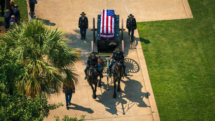 July 30, 2026, Columbia, Sc, United States: A caisson carries the flag-draped casket of the late senior U.S. Sen. Lindsey Graham during his funeral procession up Main Street, July 29, 2026 in Columbia, South Carolina. The procession carried Graham from the South Carolina State House to First Baptist Church. Columbia United States - ZUMAp138 20260730_zaa_p138_027 Copyright: xSsgt.xTimxAndrews UsxArmyx
