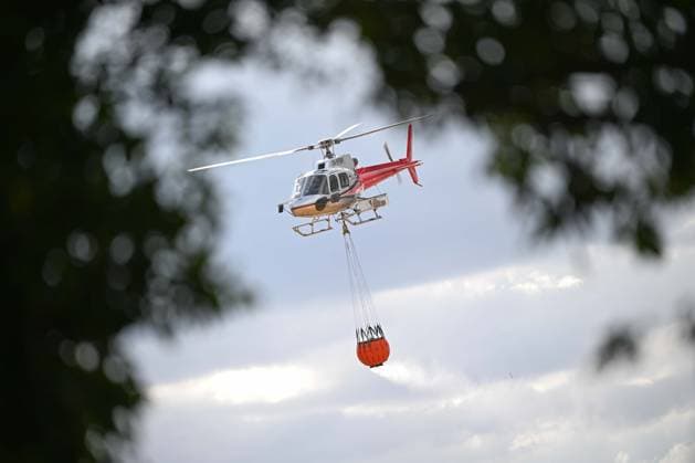 Heath fire breaks out in United Kingdom LEISTON, UNITED KINGDOM - JULY 30: Firefighters respond to a large wildfire and heath fire with helicopters at Dunwich Heath near Suffolk in Leiston, United Kingdom, on July 30, 2026. A major incident was declared after the blaze spread across approximately 100 hectares, prompting the evacuation of nearby areas. Rasid Necati Aslim Anadolu Leiston United Kingdom. Editorial use only. Please get in touch for any other usage.  Copyright: x2026xAnadoluxRasidxNecatixAslimx